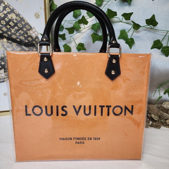 Louis Vuitton Handbags - Authentic Louis Vuitton Retail Shoppiny Bag in A PVC Tote